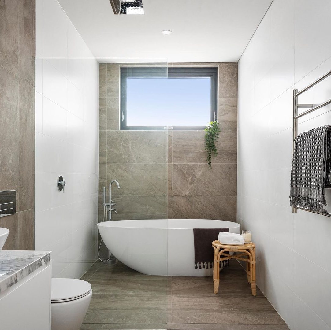 Bathroom project with bath, shower, toilet and tiled junctions